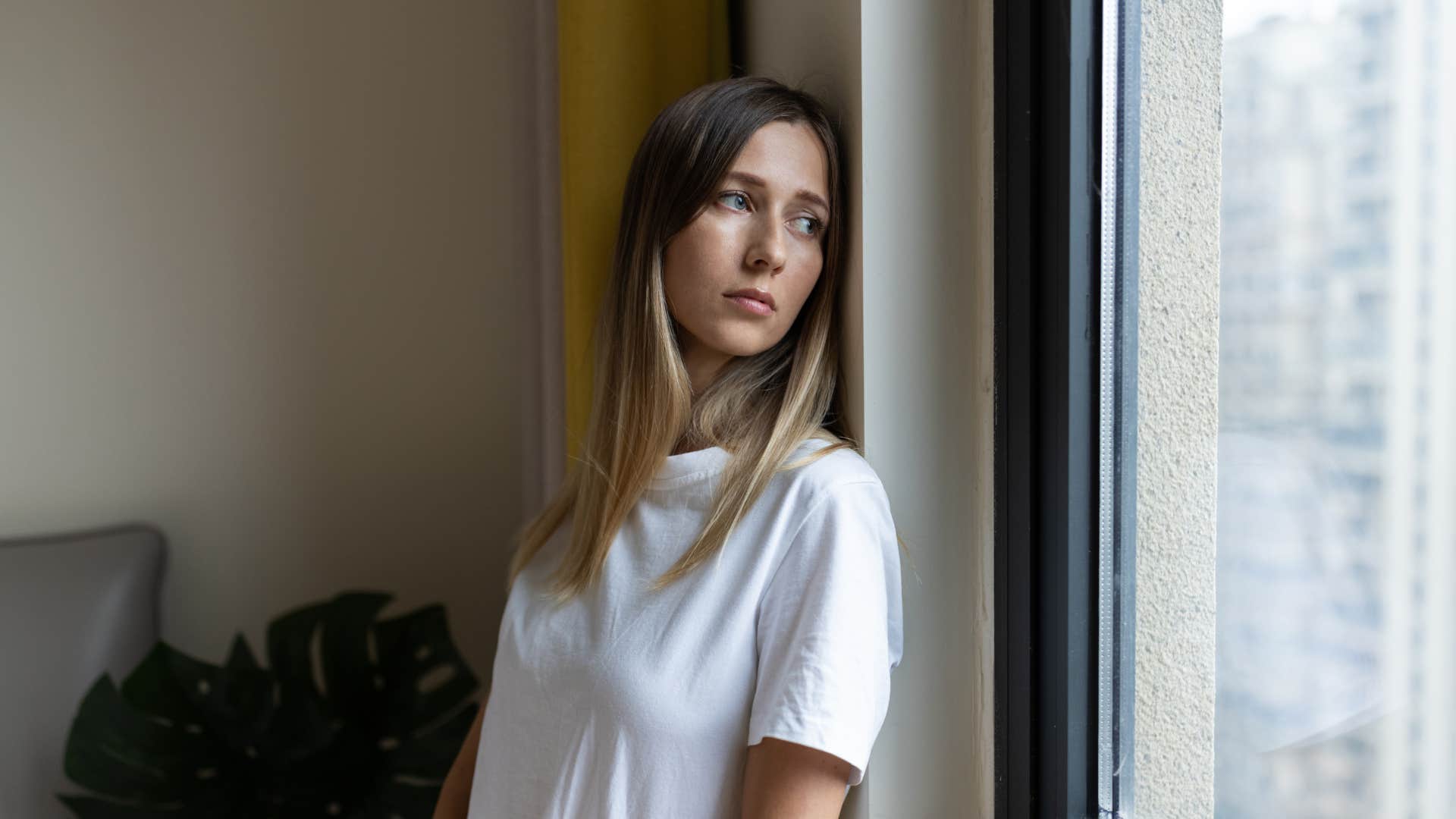 incredibly sensitive woman looking forlorn