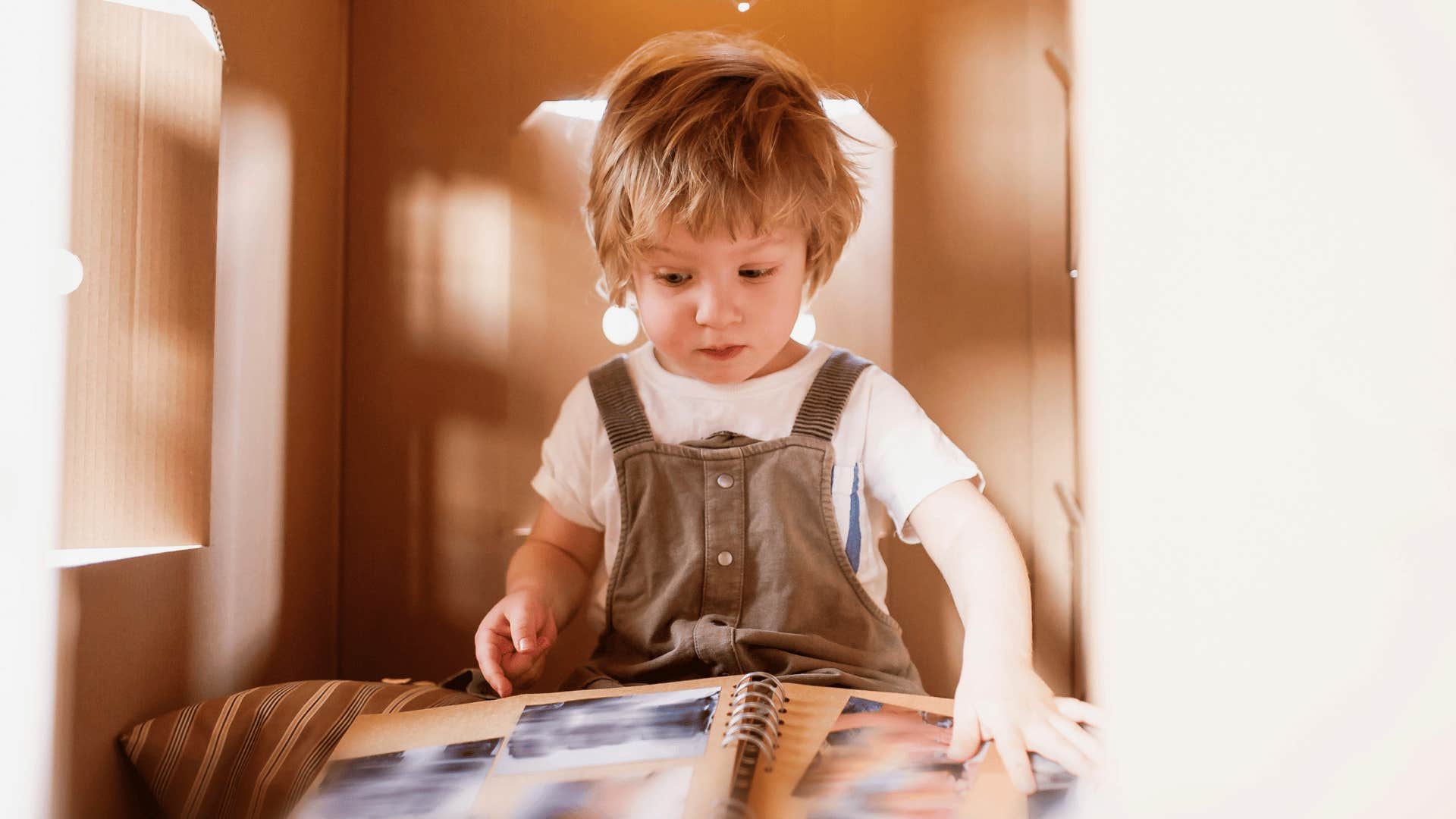 son's playfulness being valued playing in an indoor fort
