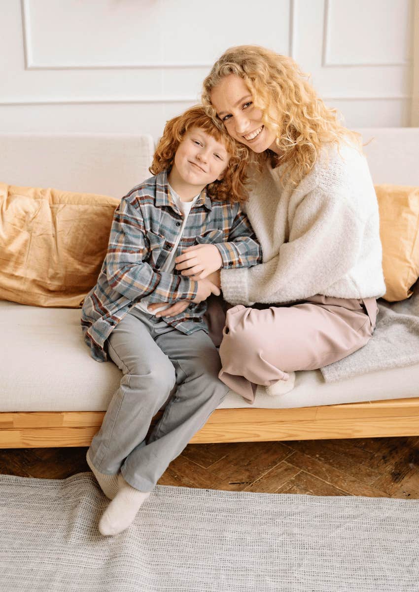 son snuggling mom on couch a part of raising boys