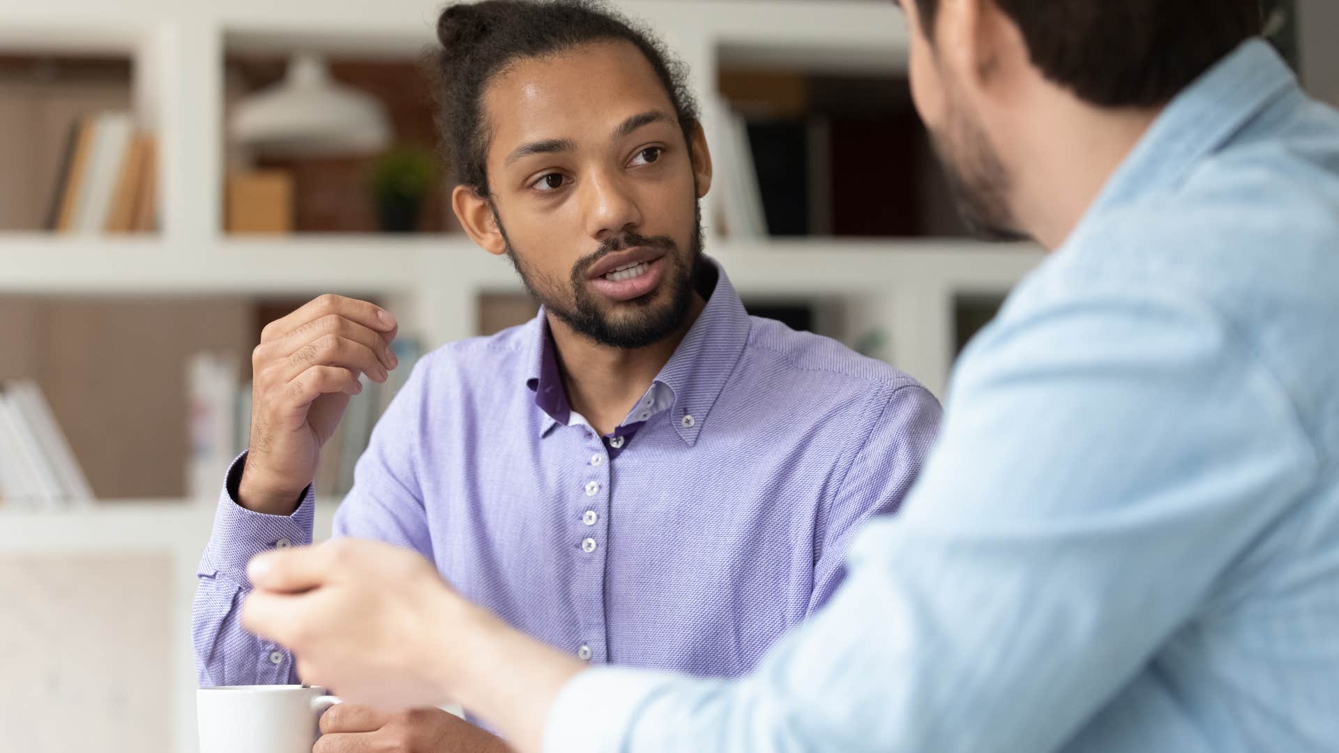 controlling man arguing with a co-worker