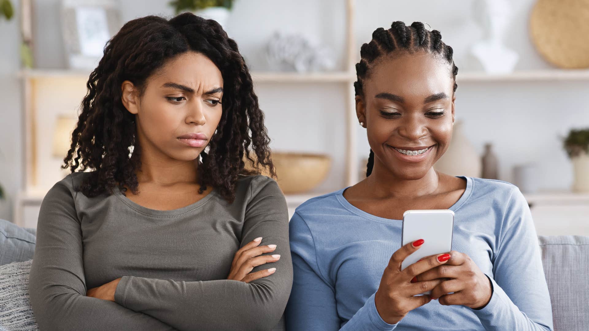 woman in gray jealous as they subtly compete with others