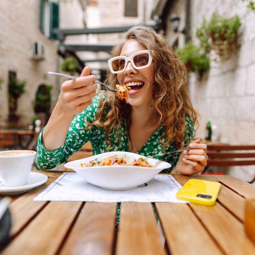 childfree woman eating new restaurant has the rare enviable trait of being open to experiences