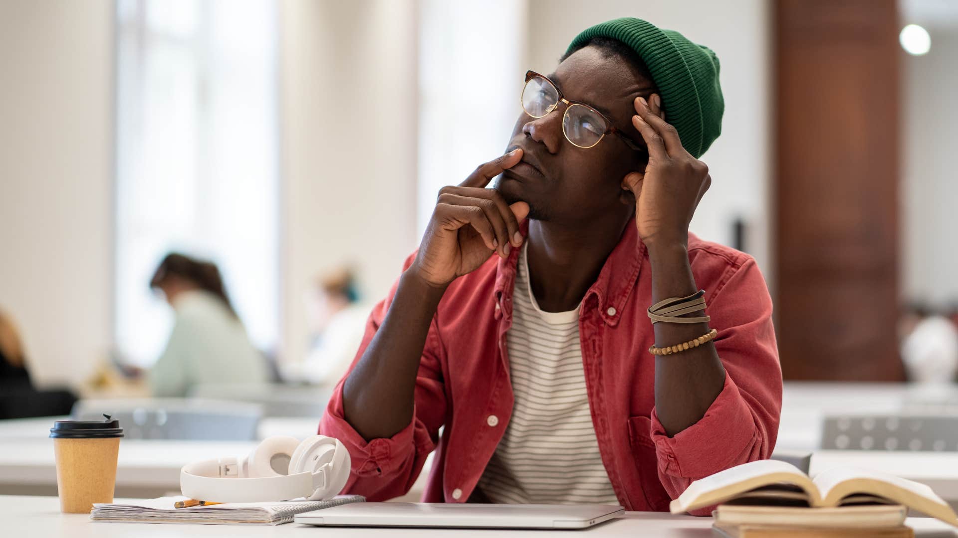 contemplative person thinks about next year showing decision leads to unhappiness