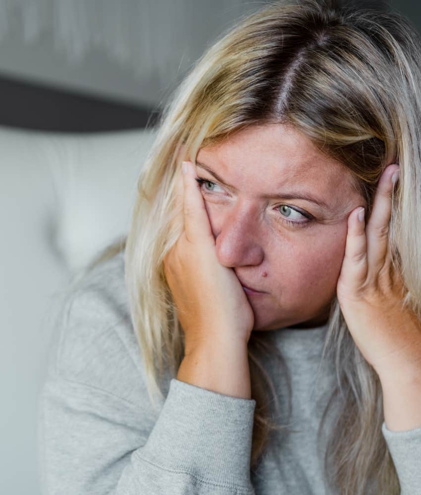 Woman over 40 looking unhappy