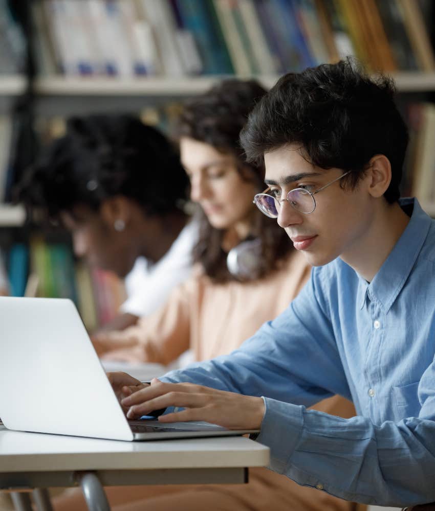 Curious students use technology in library