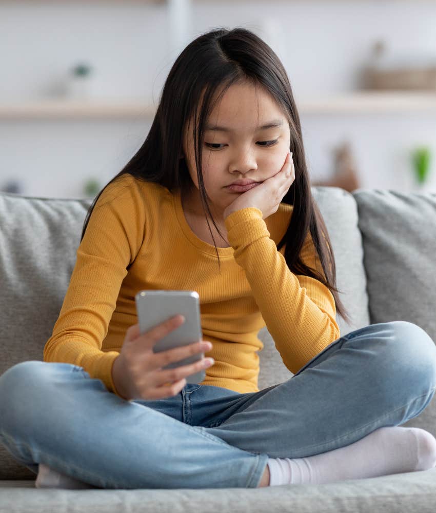 Bored kids at home with mobile device