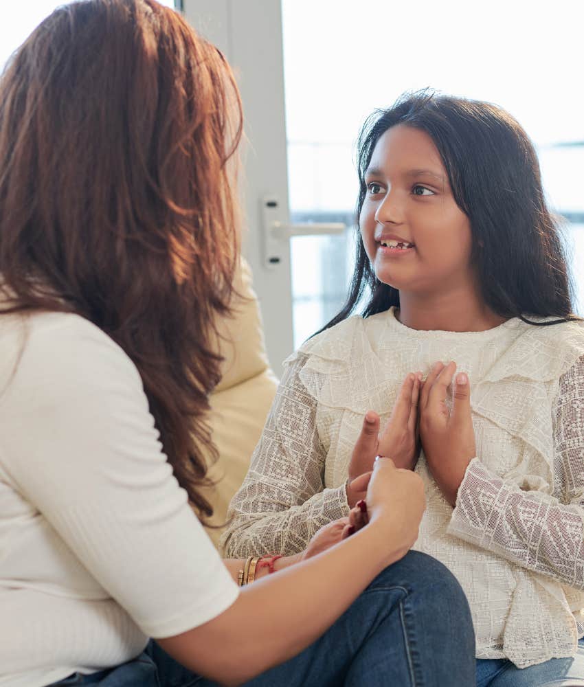 Kind mother talks to daughter who feels better