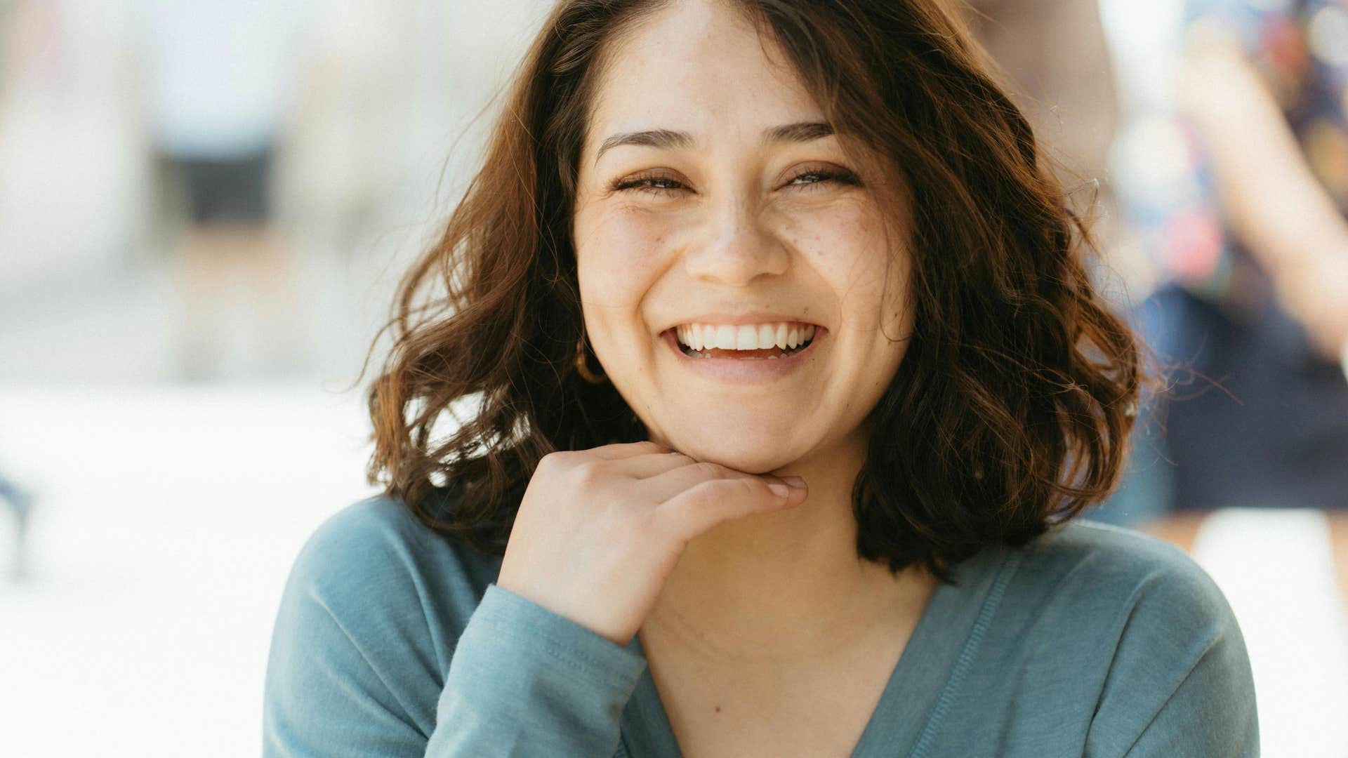 things a woman will do when she likes you but is trying not to show it remembering small details about you