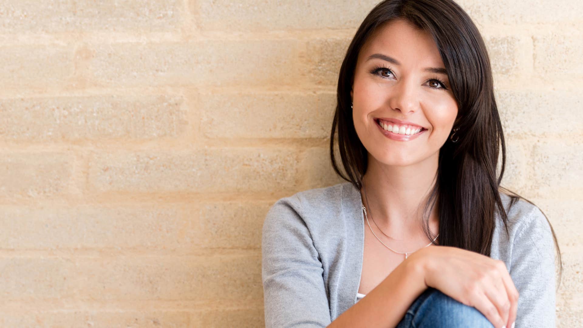 things a woman will do when she likes you but is trying not to show it she gives subtle compliments