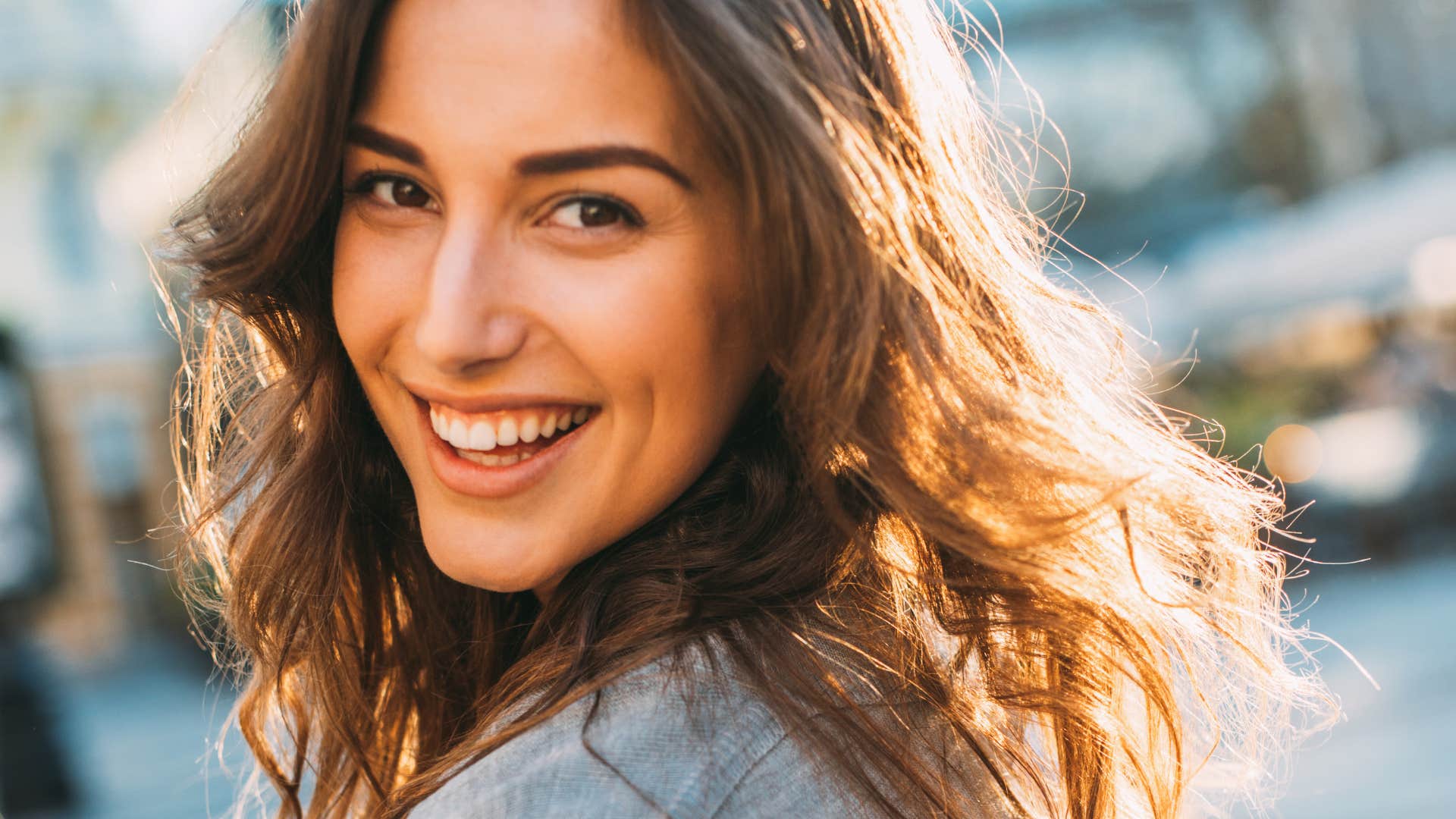 things a woman will do when she likes you but is trying not to show it she keeps her eyes on you when youre not looking