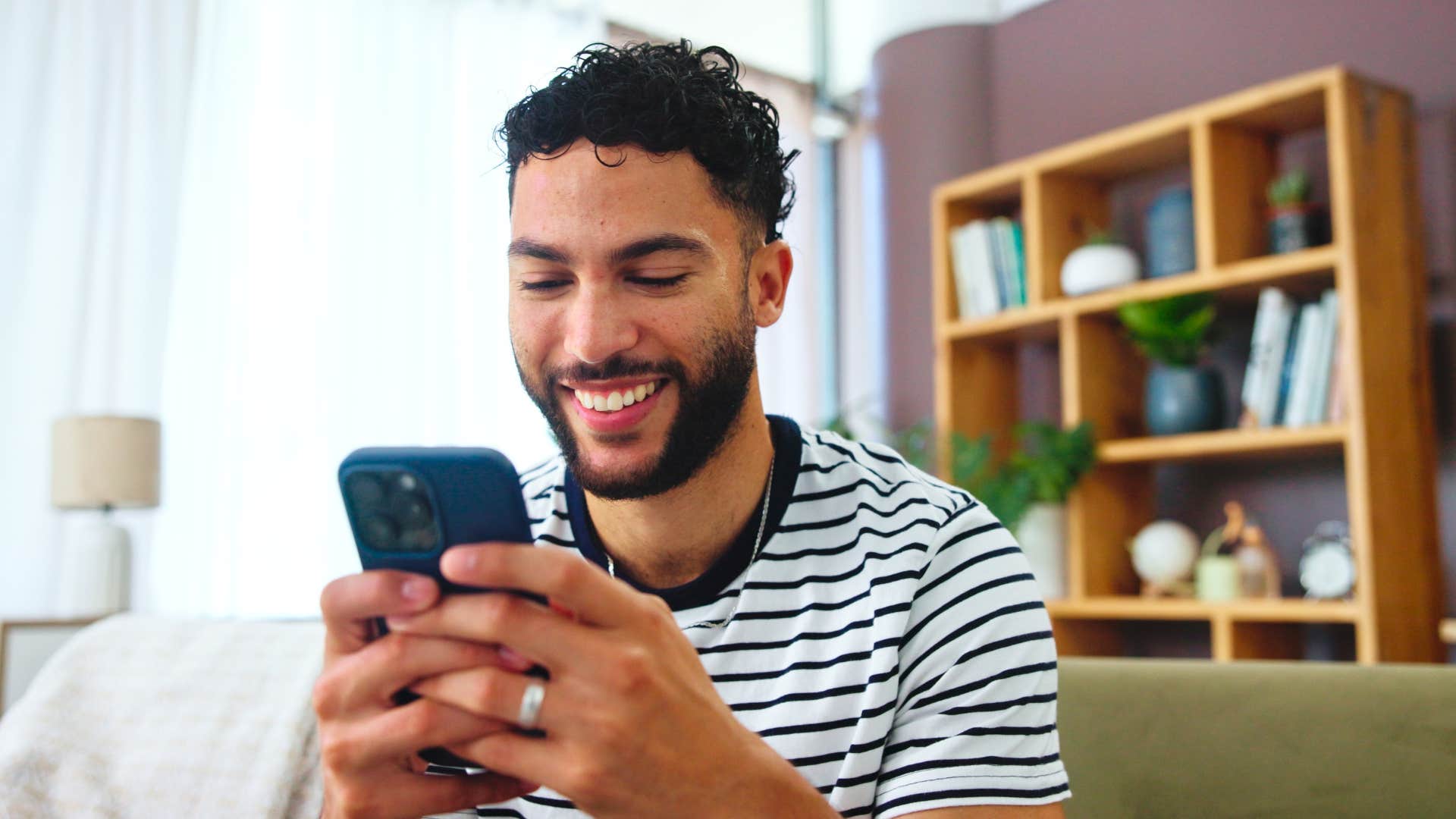 man overcoming burnout by disabling social media notifications