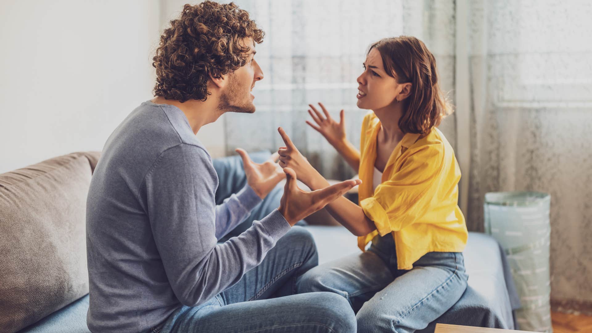 couples arguing as woman in yellow is the hidden score keeper