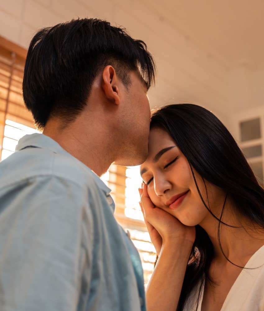 loving person kisses spouse showing good marriage behavior