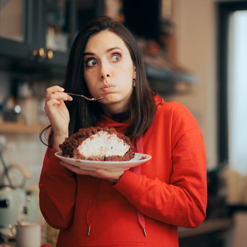 woman who doesn't eat well or exercise eating a cake