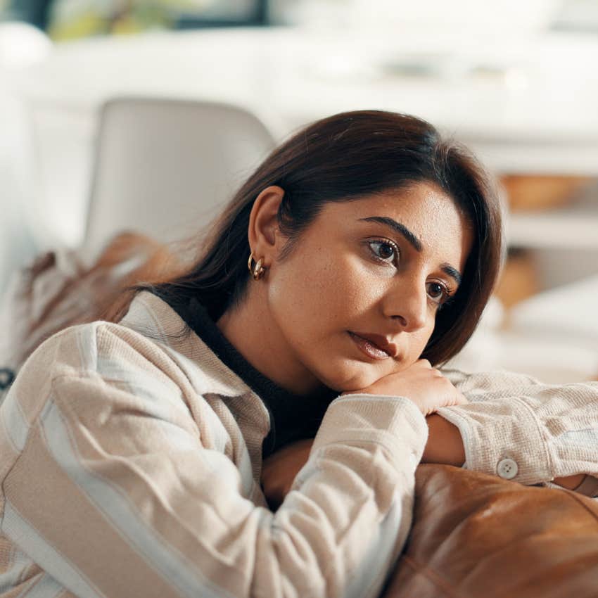 woman ignoring her mental health at home
