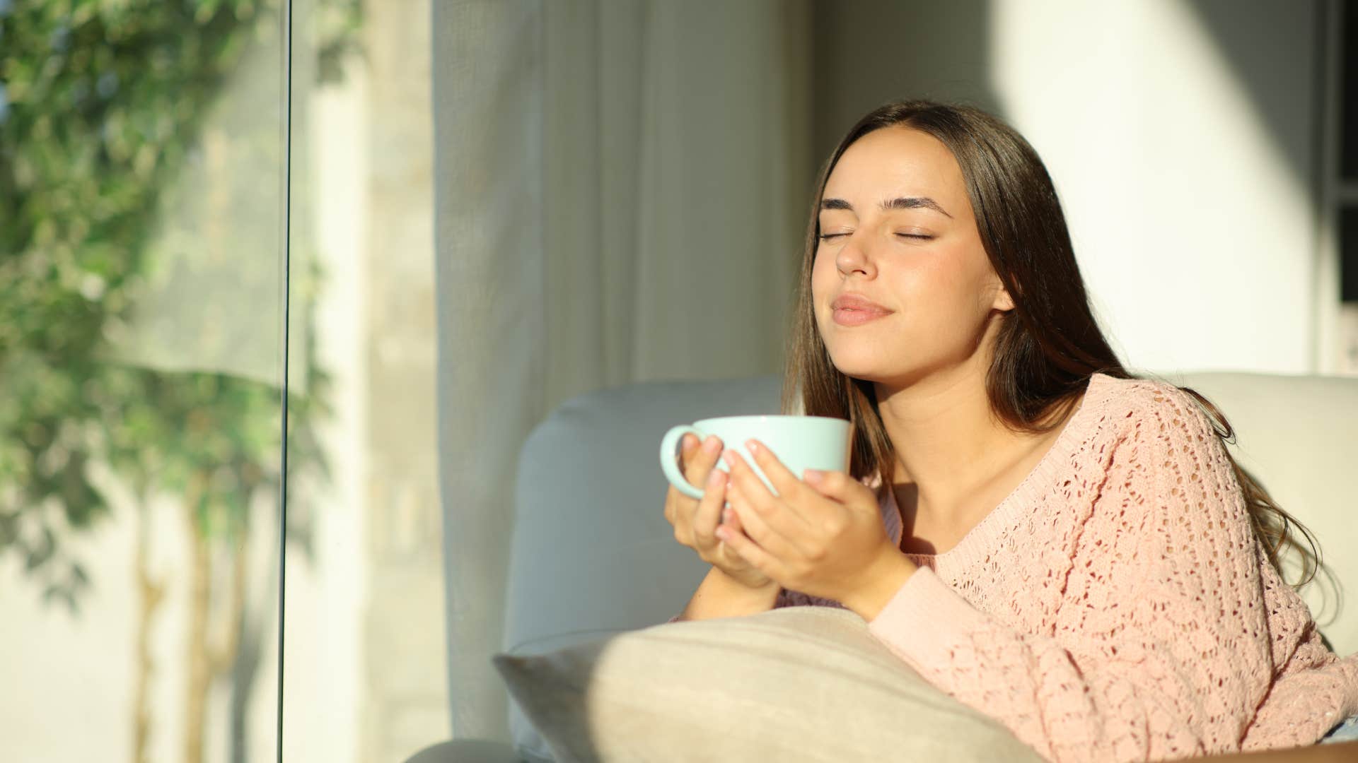 unbothered woman appreciating silence during quiet morning