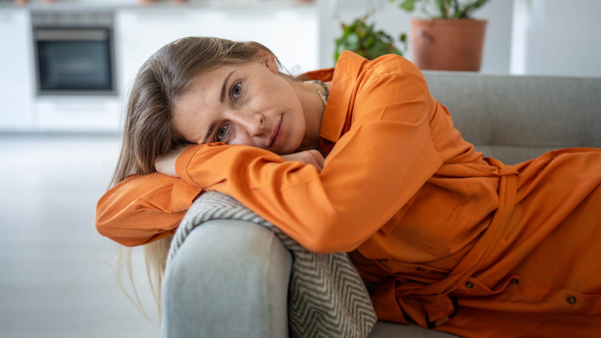 calm unbothered woman who has let go of control relaxing