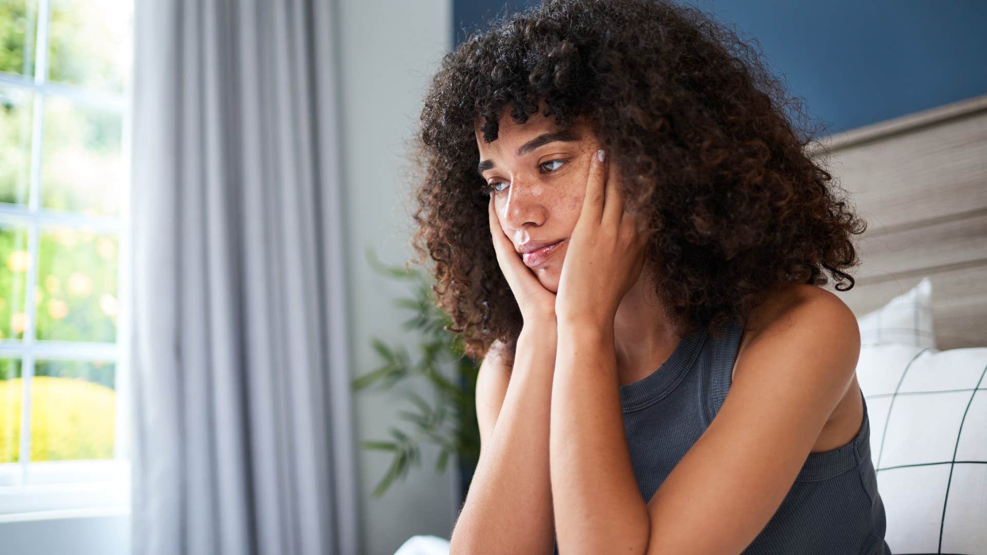 woman self-isolating when she's struggling in life