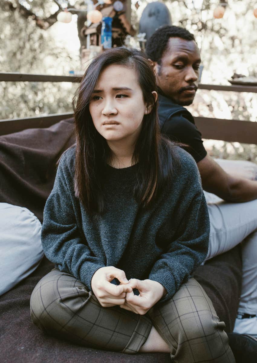 unhappy couple turned away from each other