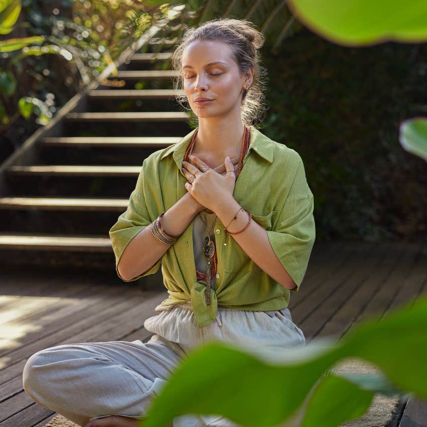 woman meditating actually works to calm down when angry