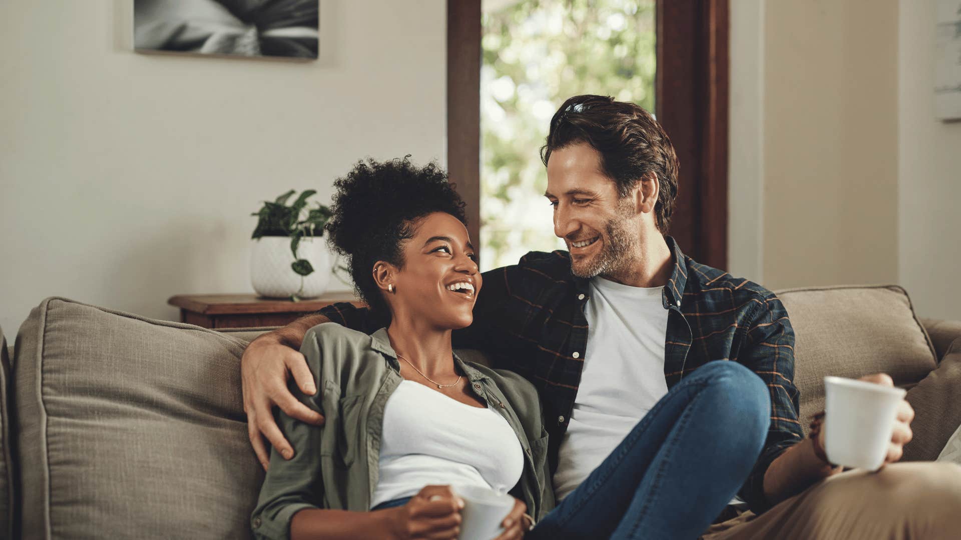 man showing woman he's deeply invested by creating a sens eof ease