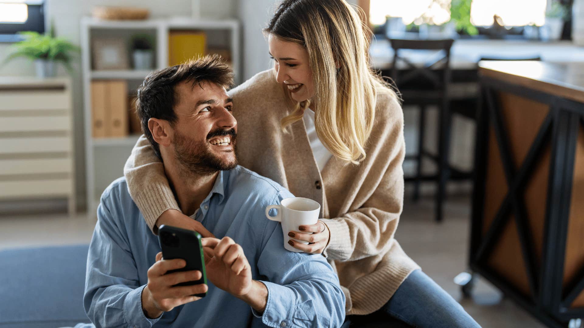 man showing woman he's deeply invested by paying attention to how she's feeling