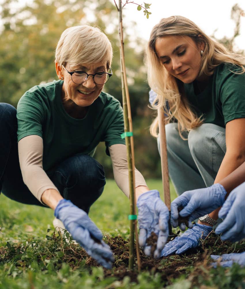 happy older person volutneers to plant tree