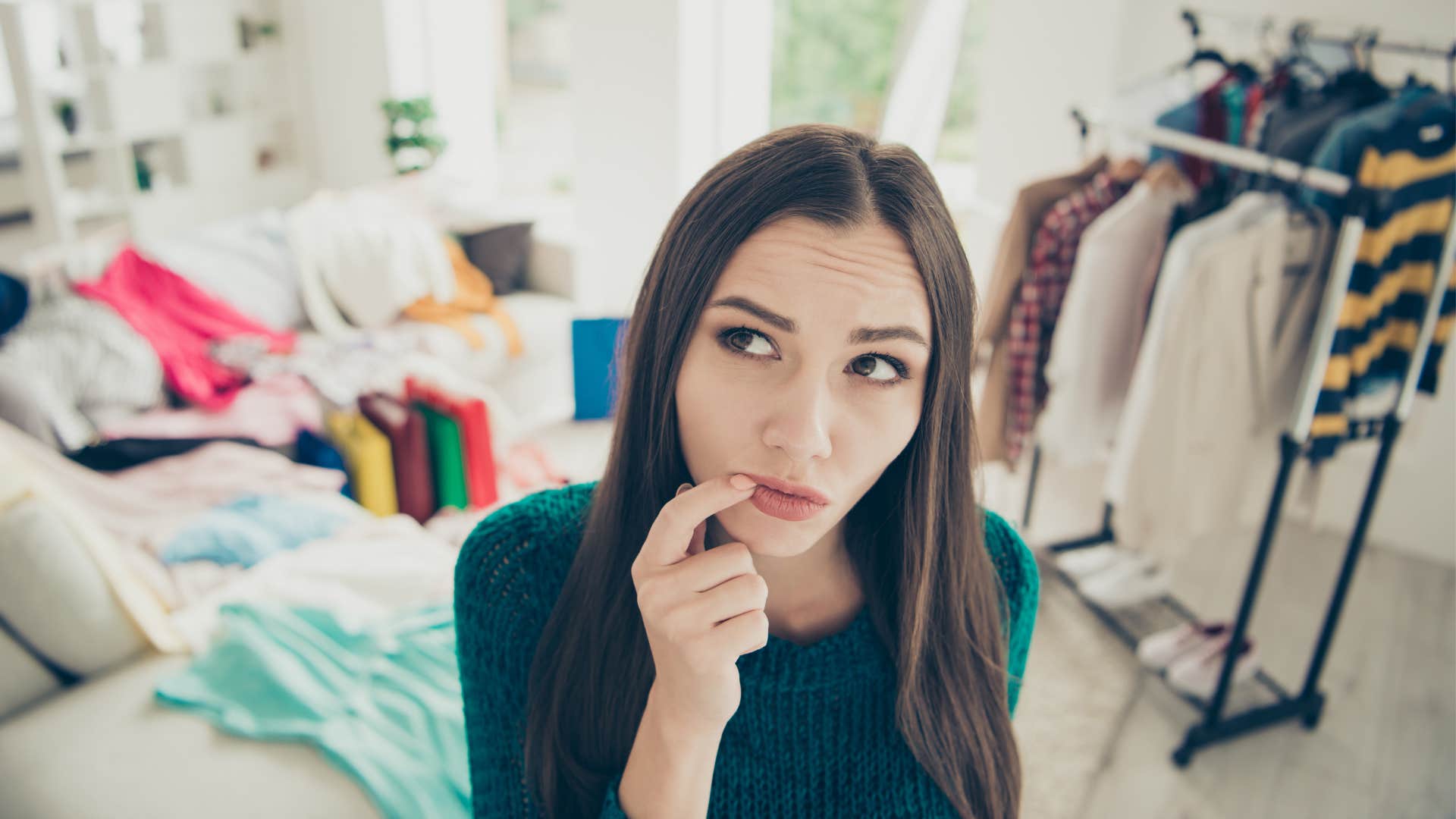 contemplatie person in messy room showing plan to look like life is together