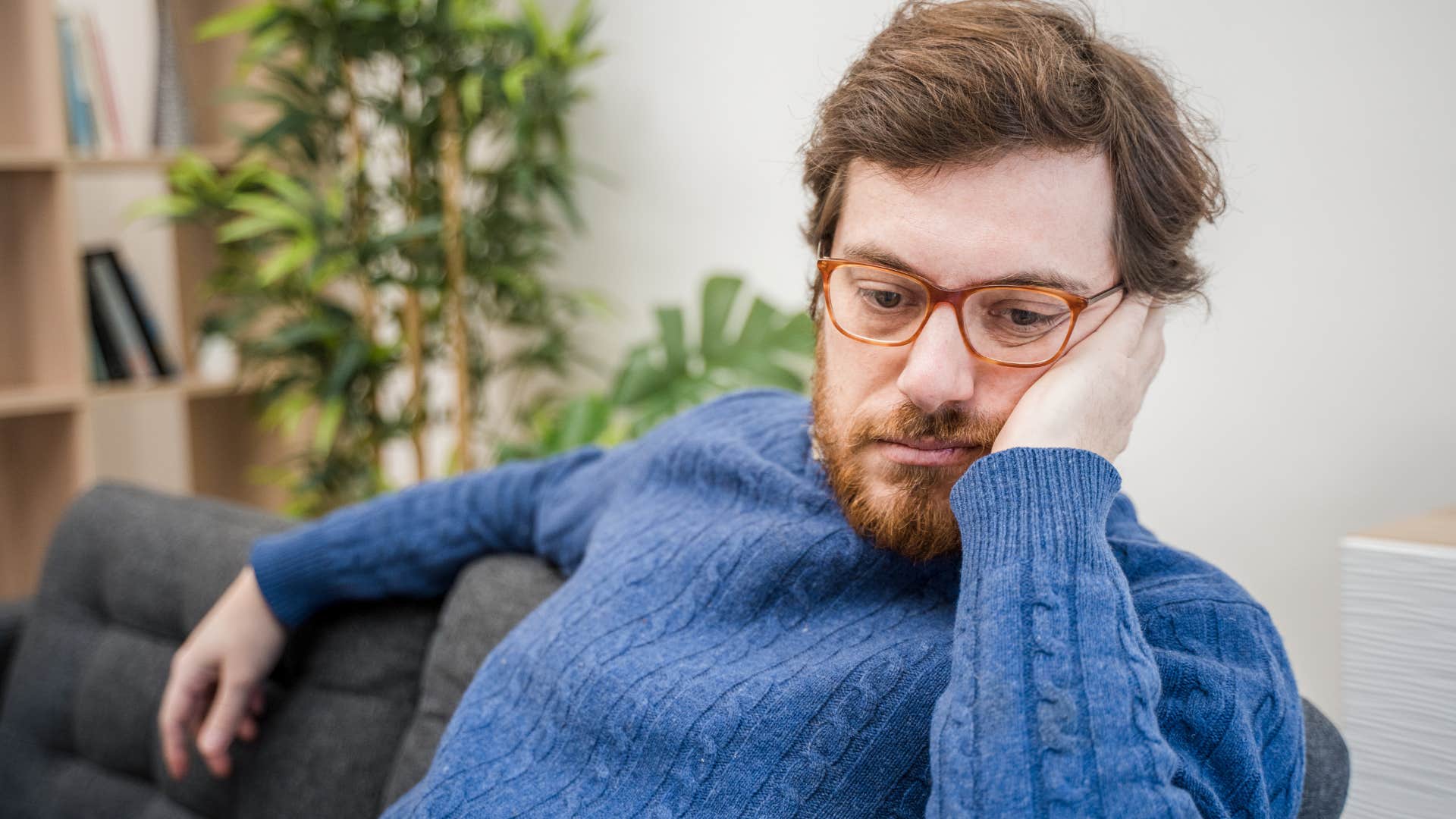isolated sad man withdrawing socially from loved ones