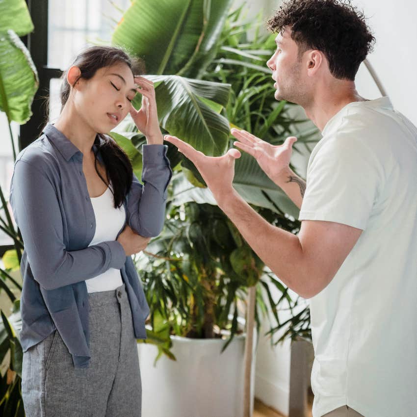 boyfriend yelling at his girlfriend who put on his military uniform
