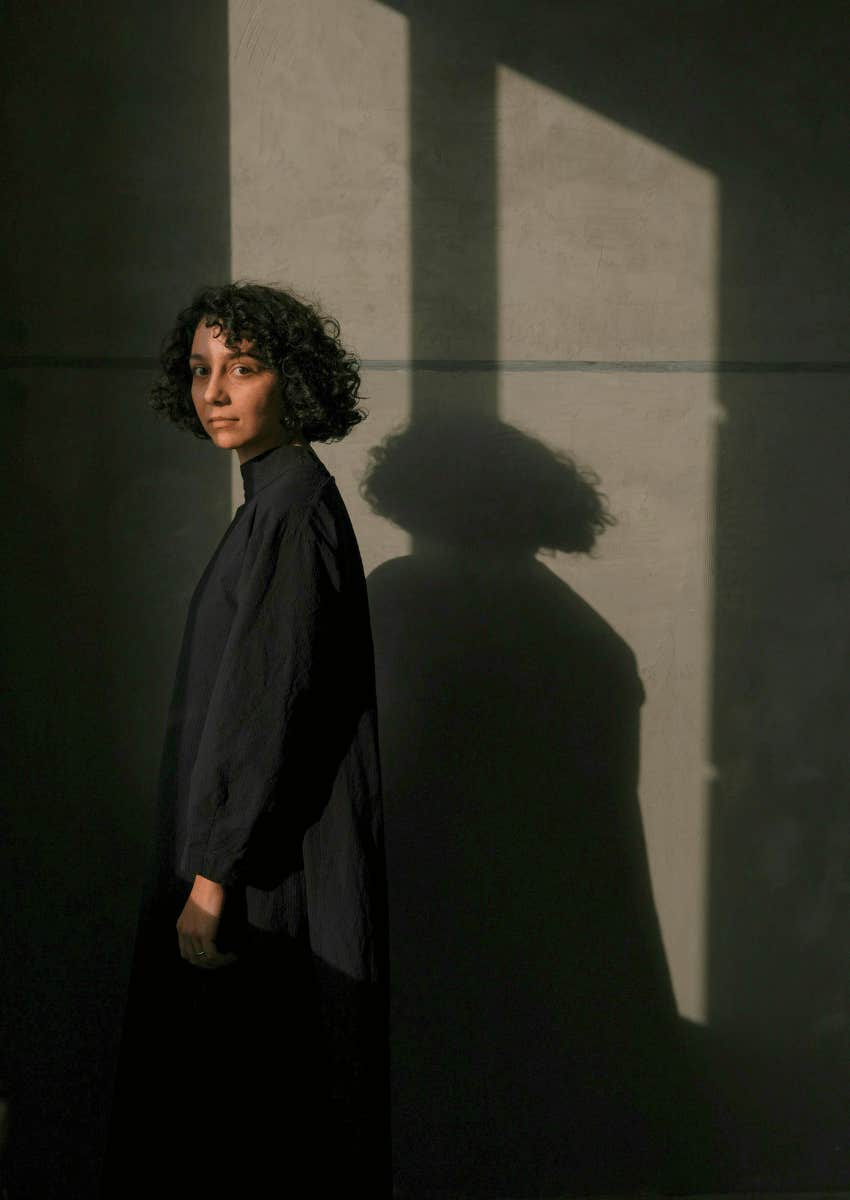 woman being mysterious makes her impossible to forget