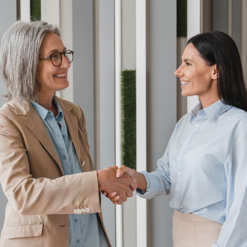 women shaking hands during job interview normal and expected behavior