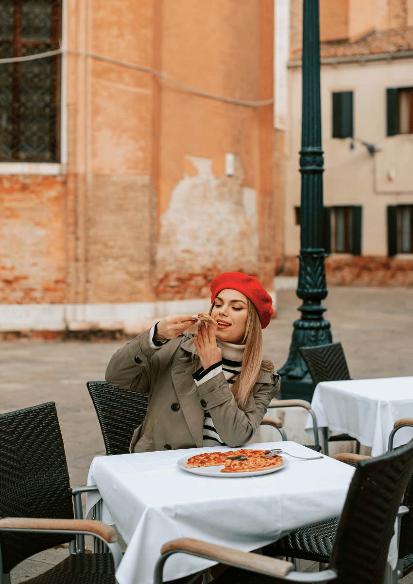 woman eating alone at her own table