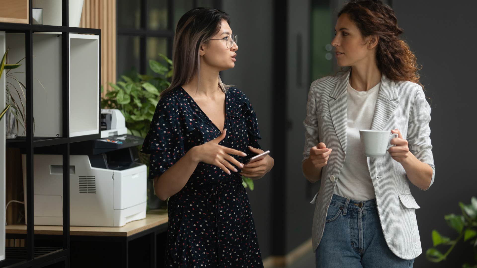 composed co-workers talking not being emotional