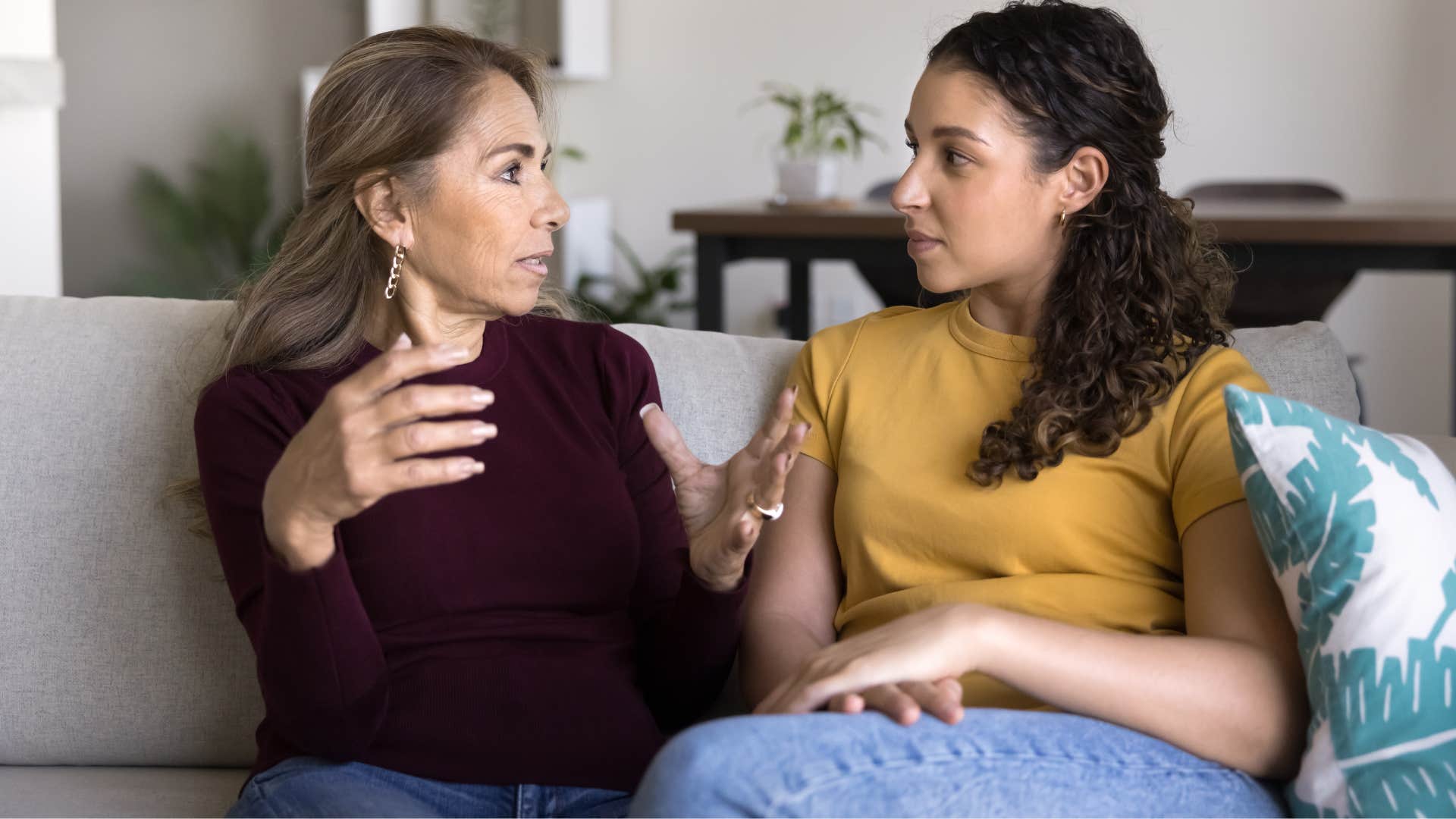 mom in red talking to daughter about never being taught what proper relationships are supposed to look like