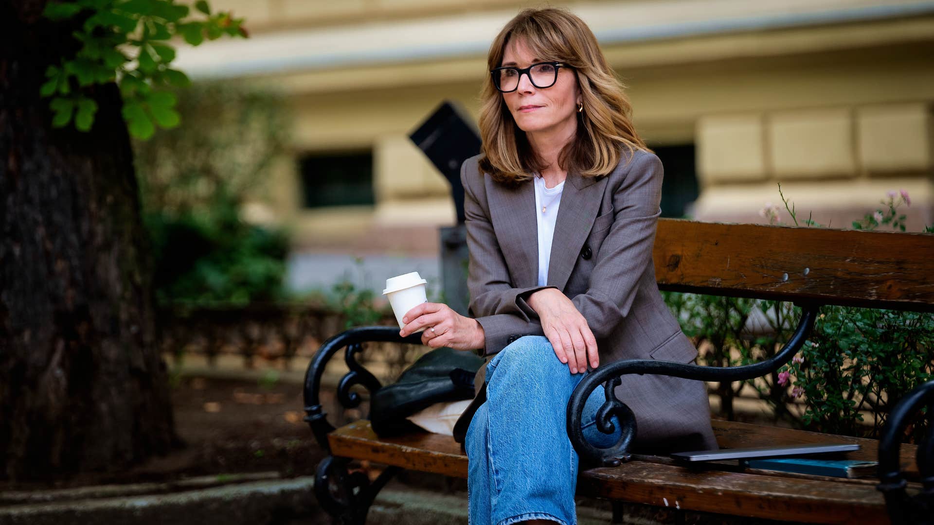 very private woman sitting alone preferring comfort over being fancy