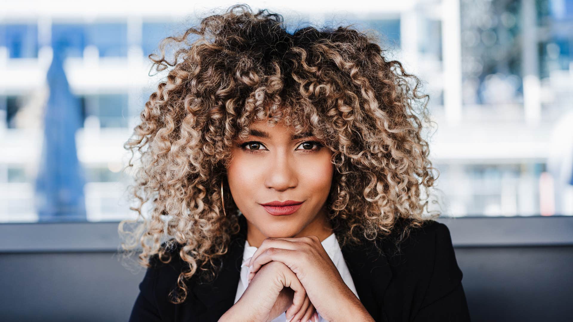 highly independent woman sitting at work