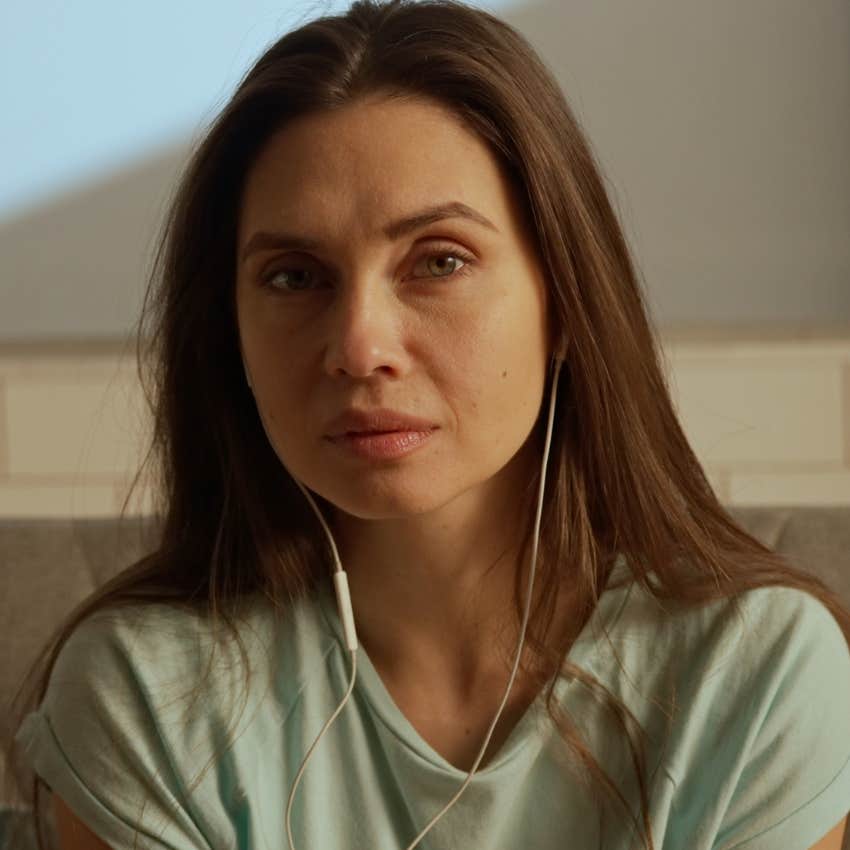 unhappy woman saying I don't even know what I want to herself