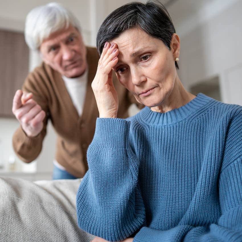 unhappy older woman telling angry husband i'm just tired