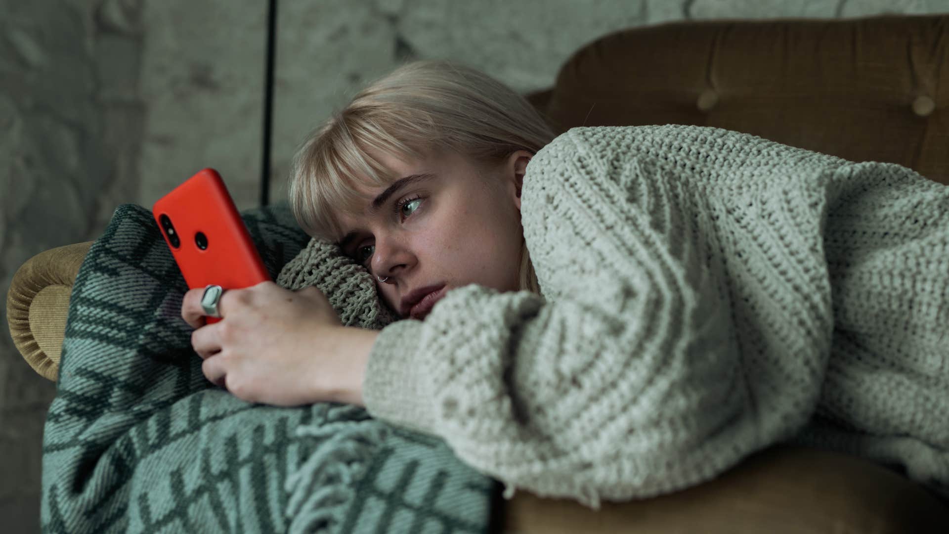 woman chasing being liked looking at phone texting