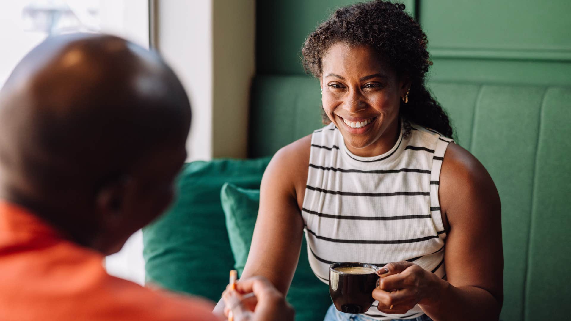 Woman who prefers depth over convenience talking to a friend.