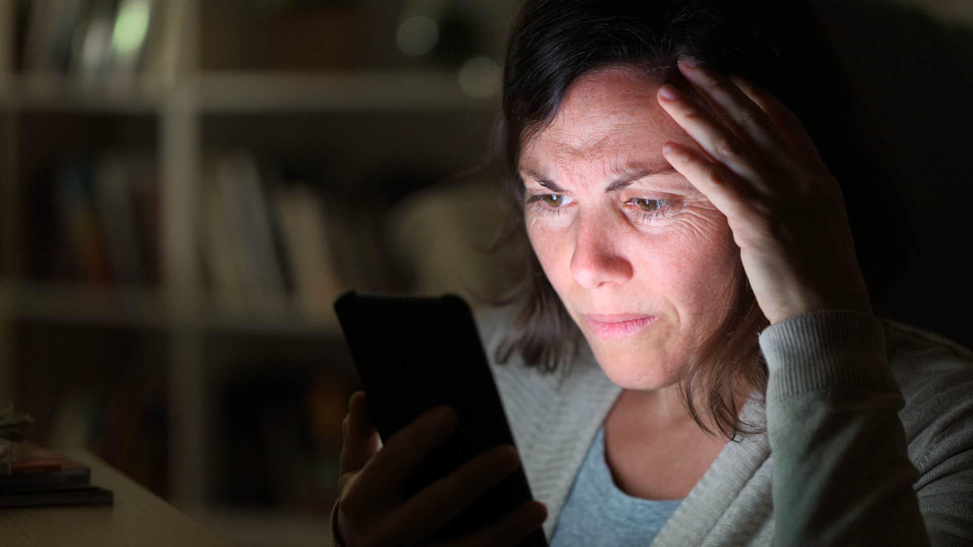 Woman struggling with decision fatigue while deciding what to eat.