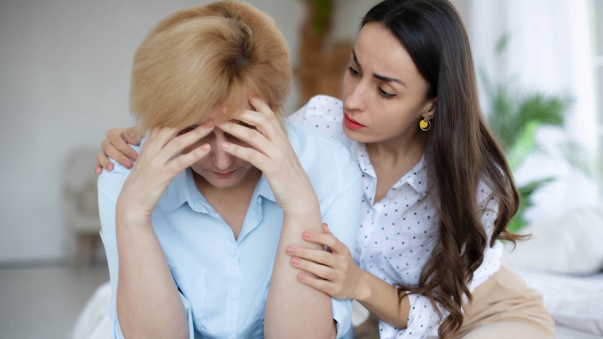 incredibly giving woman comforting her mother at home