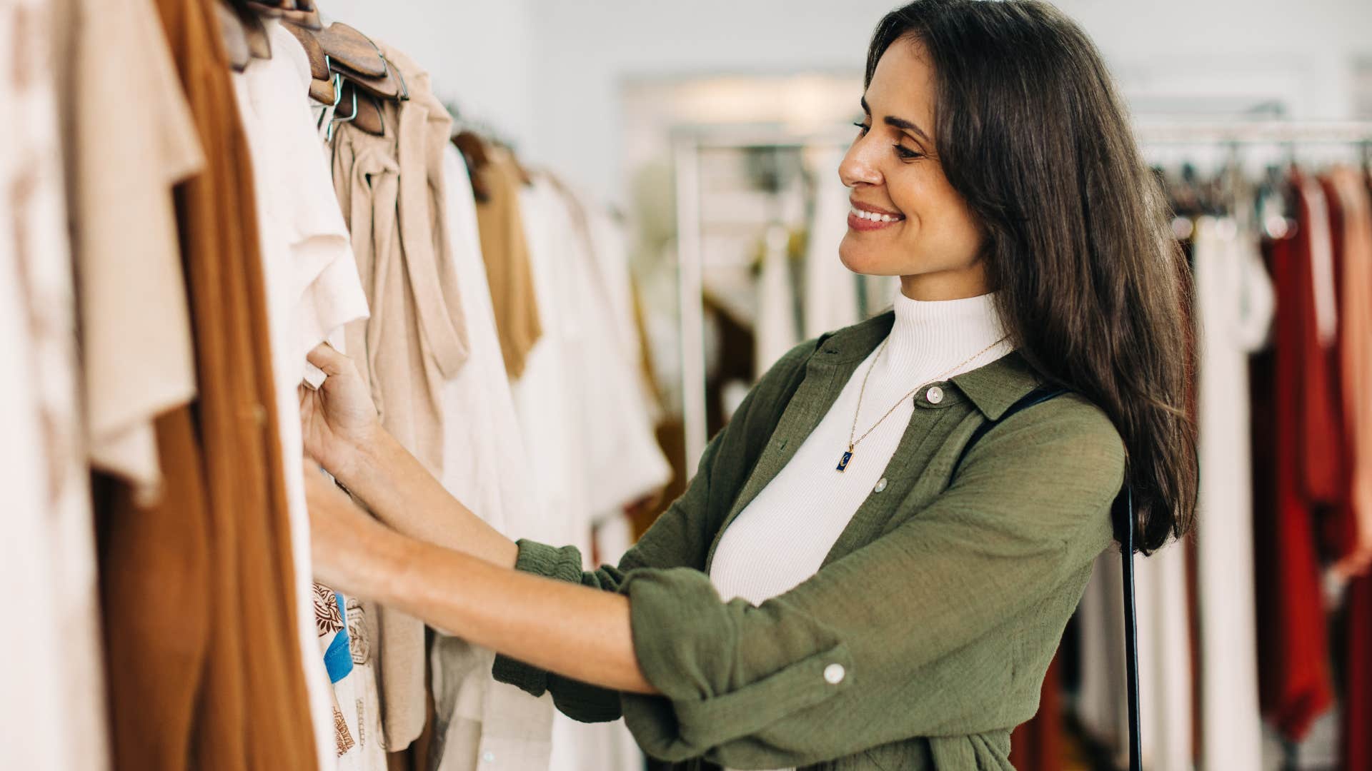 incredibly disciplined woman shopping in sales rack clothing