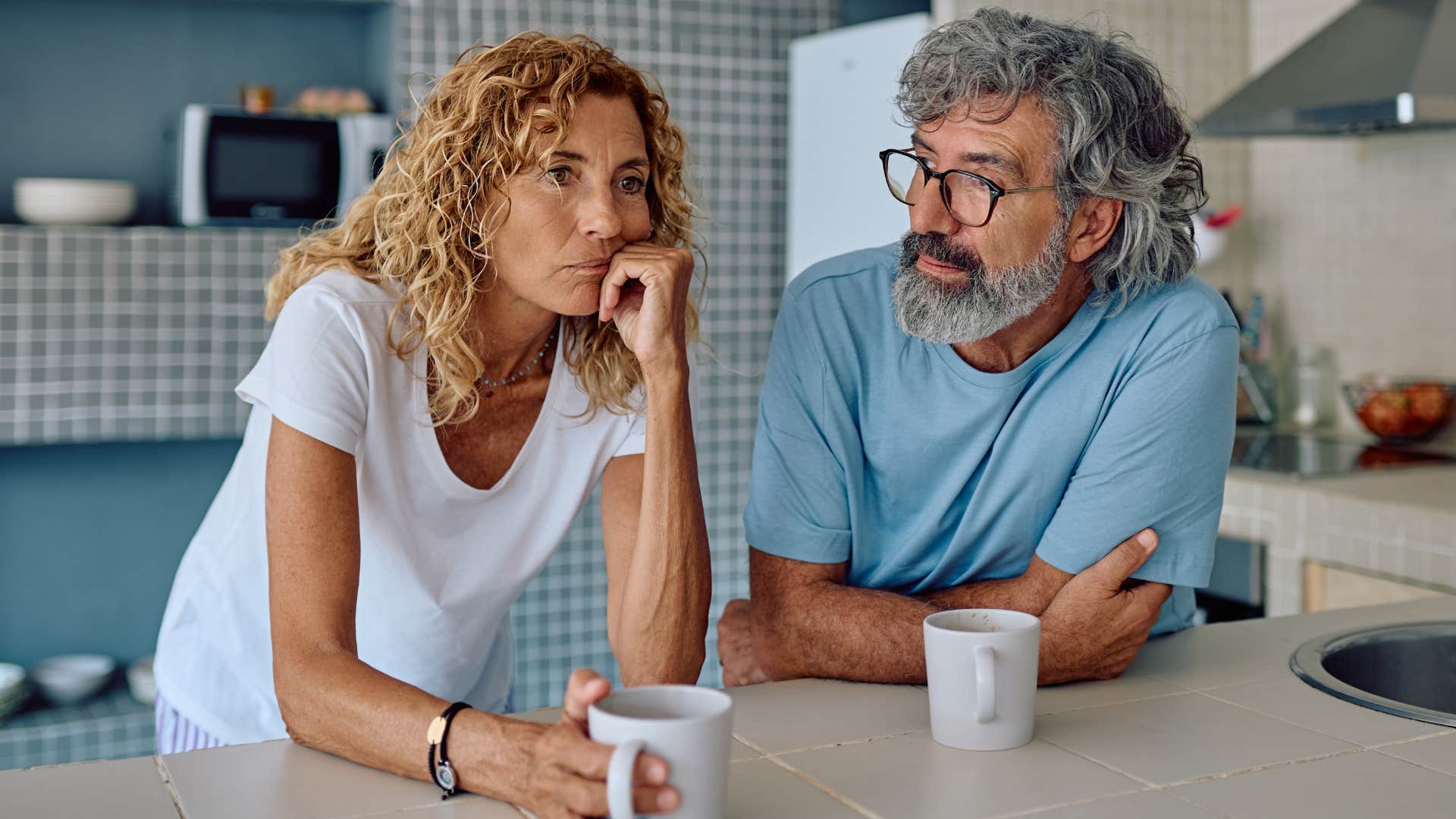 Woman who rarely brings up issues they resolved sitting with her partner.