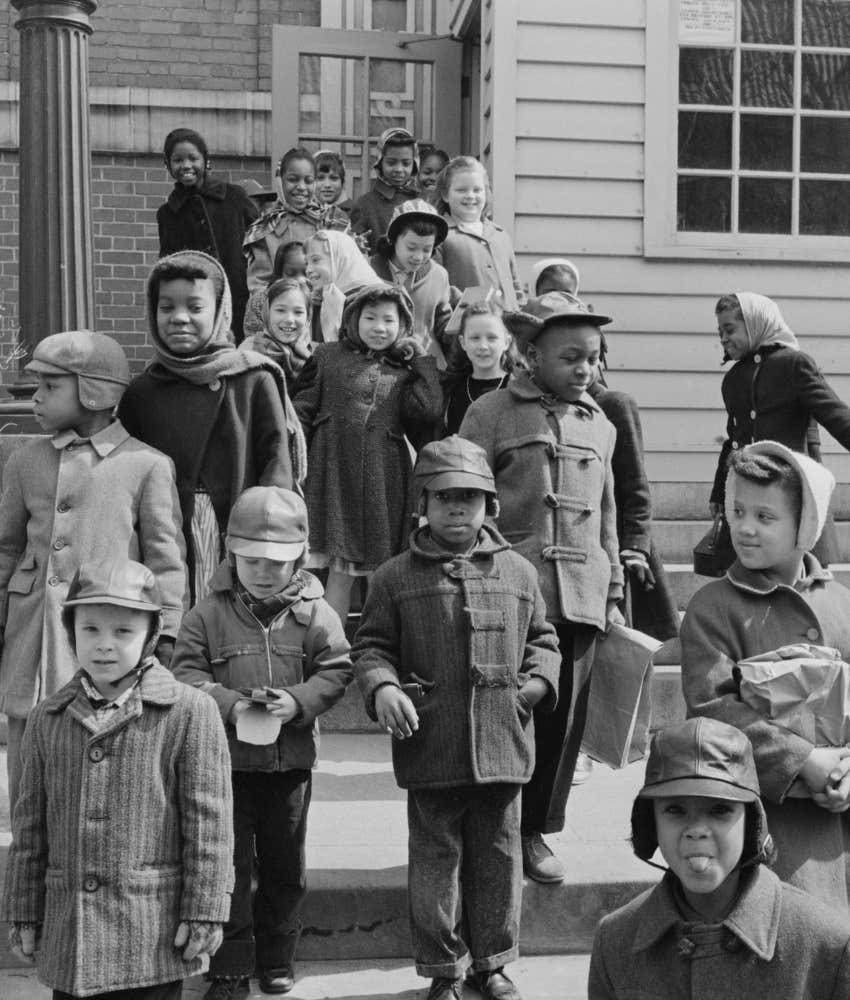 Vintage image of 1960s school children stepping out into the world