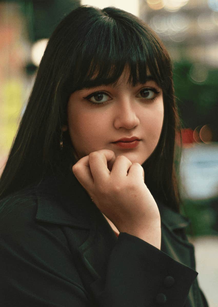 young woman with emotional strength making peace with her inner critic