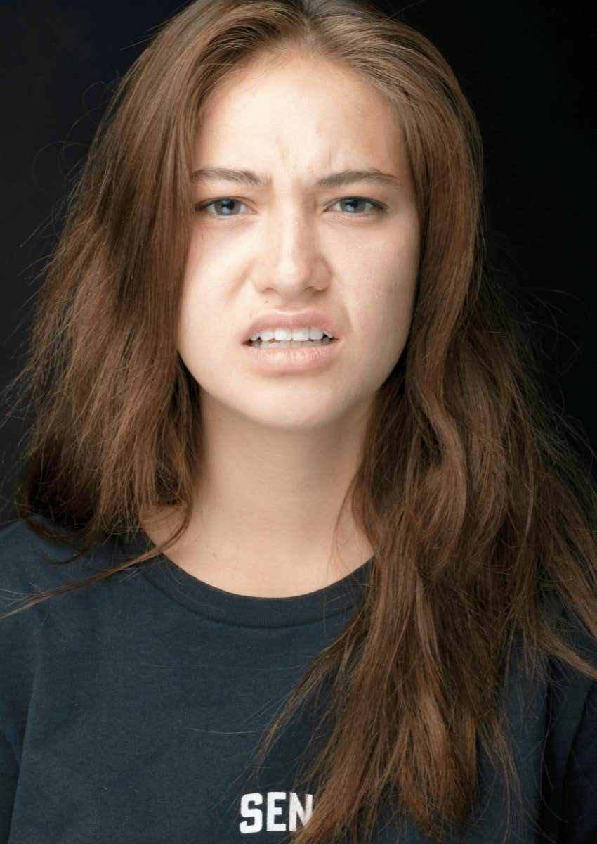 young woman with a look of disgust