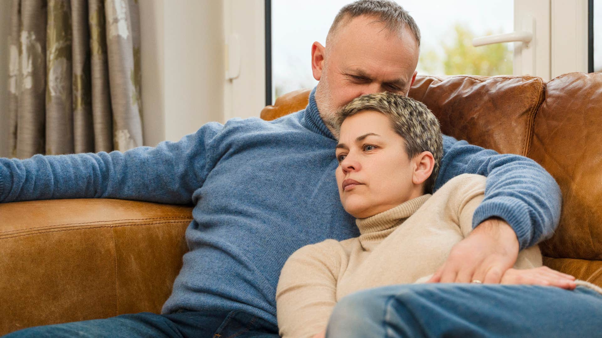 couple on the couch appreciating silence