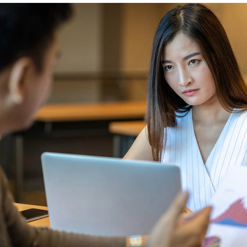 Woman with coworker frustrated by the corporate lingo